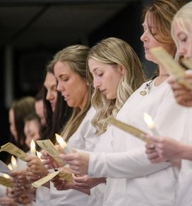 Nursing students read their oath at their pinning ceremony