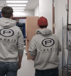 A still taken from a BOCES video shows two SUNY Adirondack ECCA graduates working at Praxis
