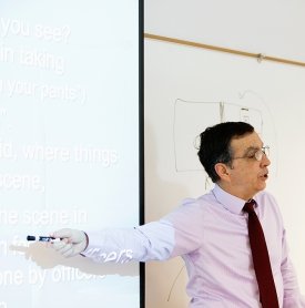 A professor teaches students in a Criminal Justice class