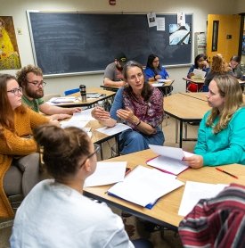 SUNY Adirondack Professor Lale Davidson leads a Creative Writing class discussion