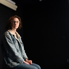 SUNY Adirondack Media Arts alumna Samantha Hyde is seen in an on-campus portrait studio.