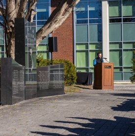 Coordinator of Dwyers Grant Jeremy Duers speaks at an on-campus Veterans Day event