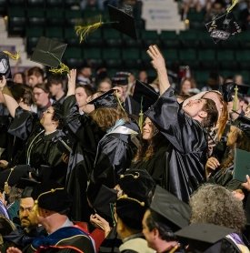 20204 graduates throwing their caps in the air at the end of the graduation ceremony