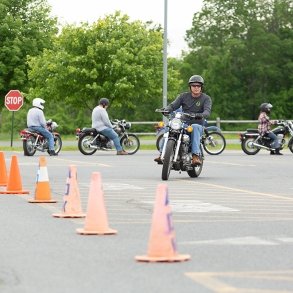 Adult students learning to ride motorcylces