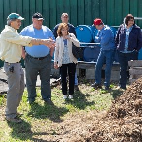 Adult students learning how to compost