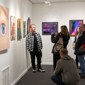 Students showing their art at the LARAC gallery