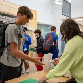 A student checks in at Manufacturing Day