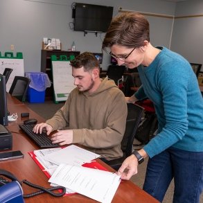 Instructor Ann Wojtowecz assists a student