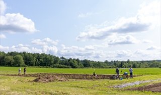 Students working on the campus farm