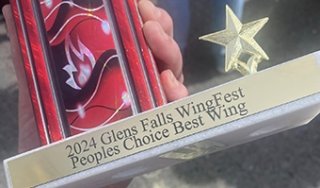 A closeup image of the People's Choice Award trophy for Glens Falls Wingfest 2024