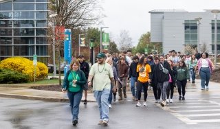 SUNY Adirondack campus and community members walk in the 2025 Walk Out of Darkness event on campus.