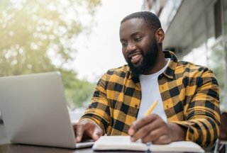 A man works on a computer