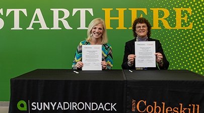SUNY Adirondack and SUNY Cobleskill presidents celebrate a seamless transfer agreement at SUNY Adirondack Saratoga