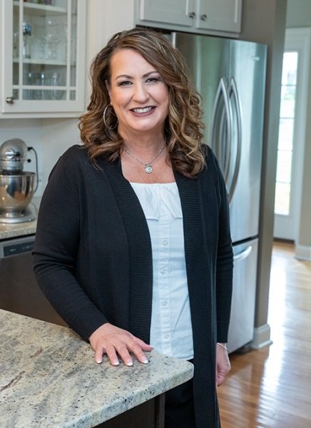 Business owner Eileen Caliva is seen in her kitchen