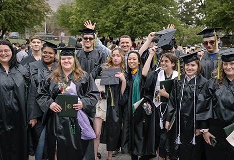 Culinary Arts graduates celebrating at the 2024 graduation ceremony