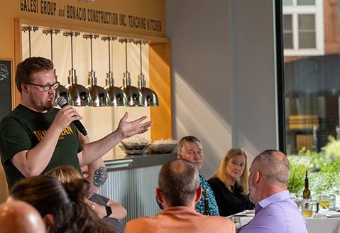 Whitman Brewing Company head brewer talking to Collaborative Cuisine guests