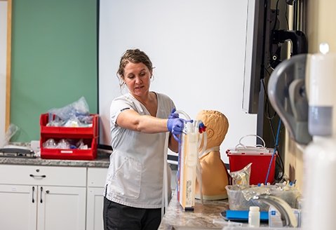 A nurse instructs a class in SUNY Adirondack Saratoga