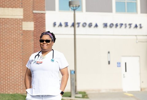 Afeina France, a nurse and SUNY Adirondack alumna, stands outside Saratoga Hospital
