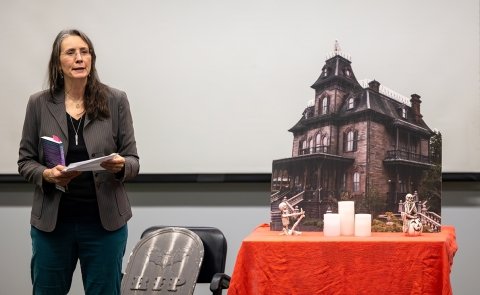 English Professor Lale Davidson reads from her works at a Writers Project series event.