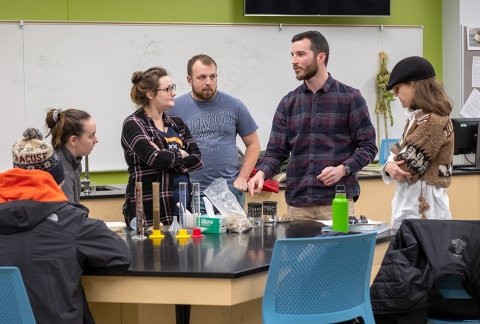 Students in a lab learning about soil