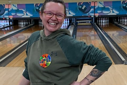 A veteran smiles during a bowling event