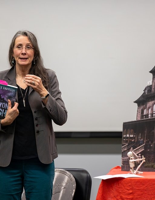 Distinguished Professor of English Lale Davidson presents to class